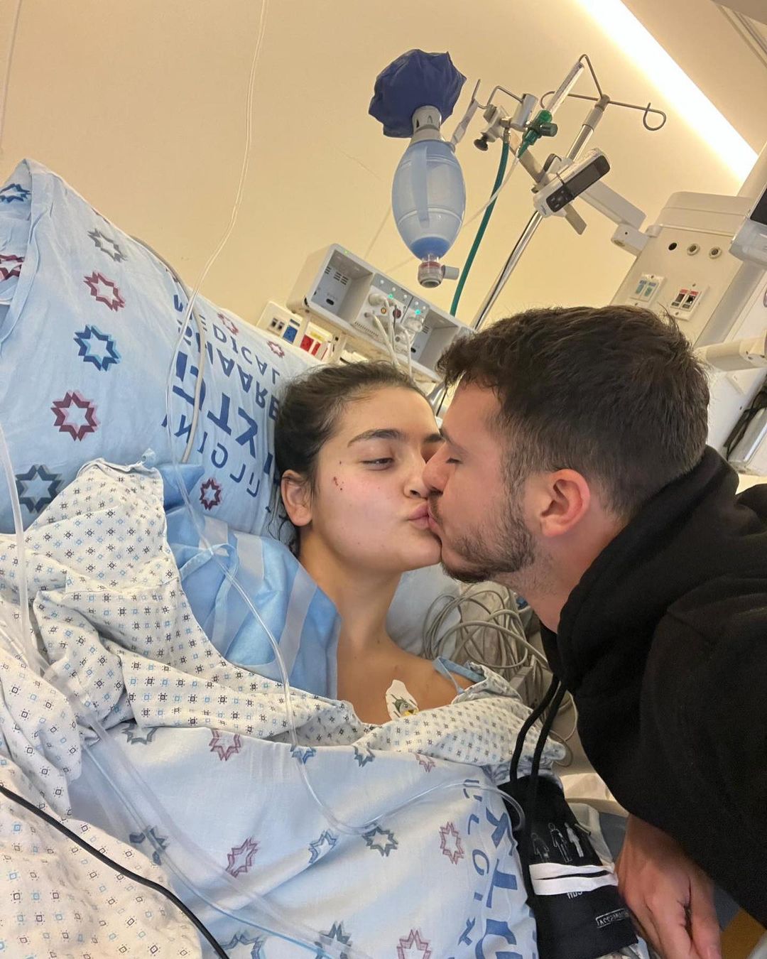 A guy kissing Eden