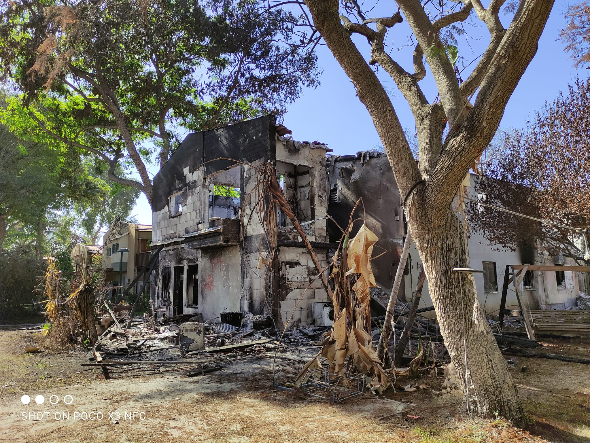 The front part of the house is destroyed and burned