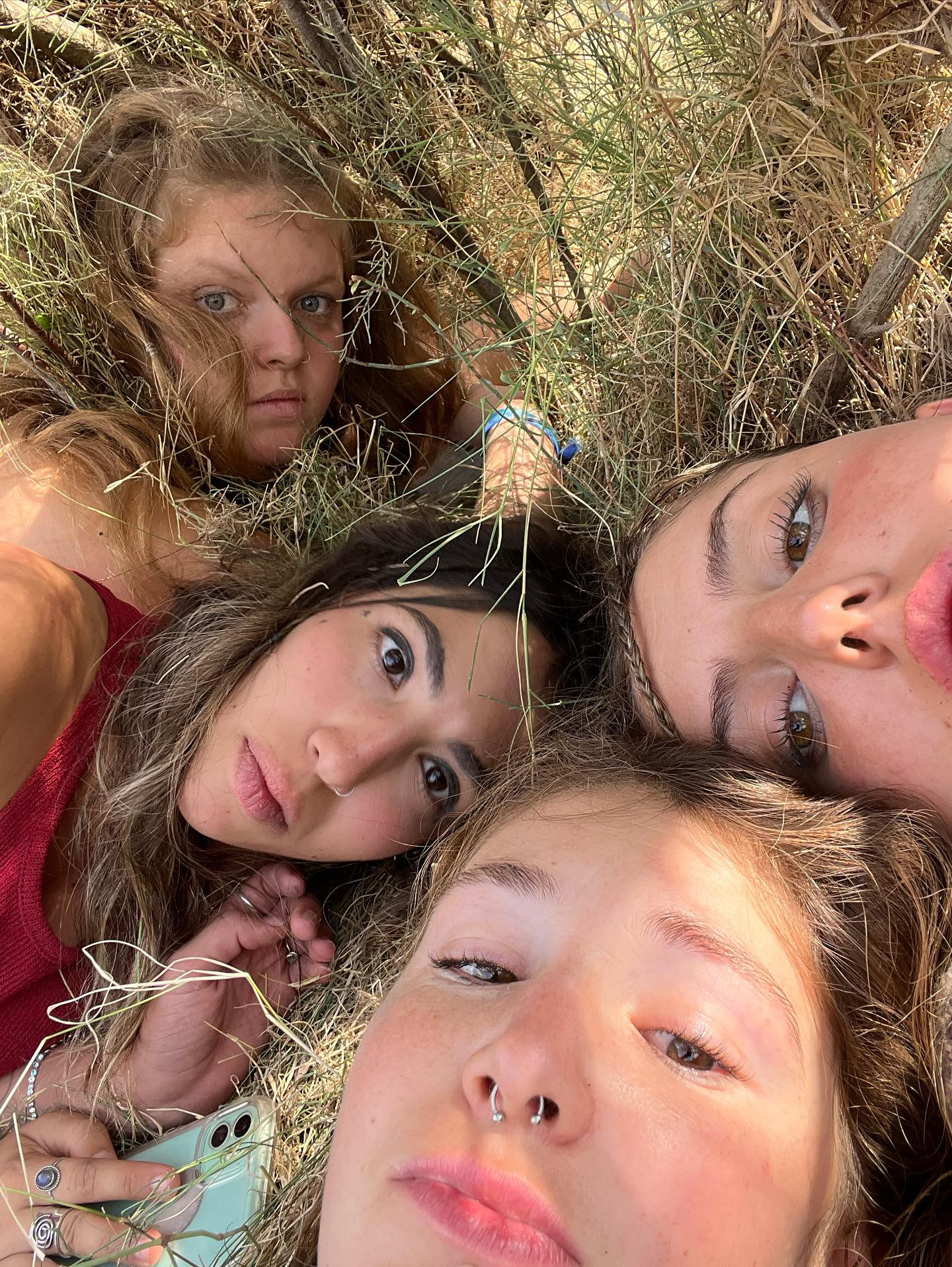 Millet and three girls hiding in the bushes