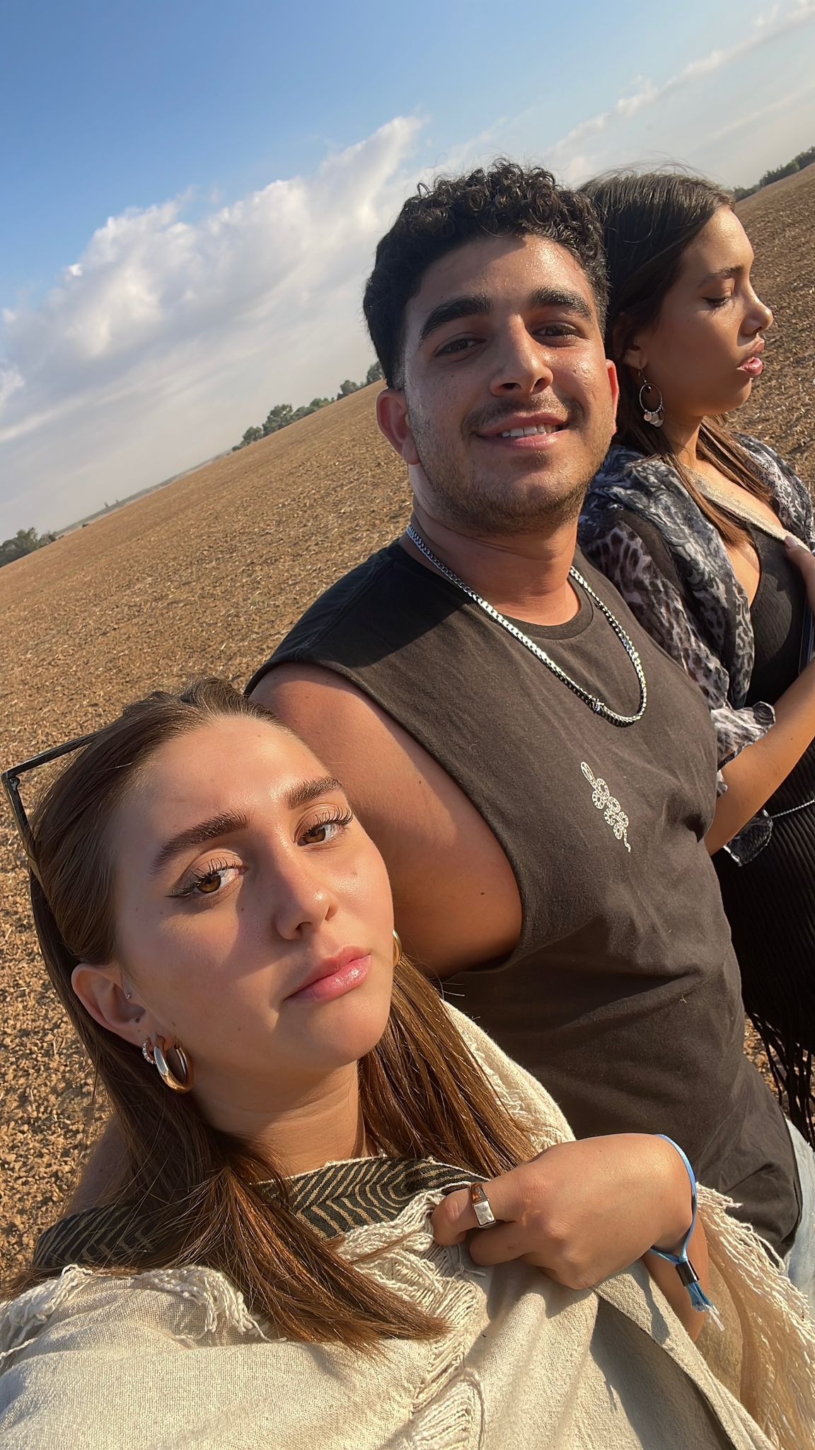Adir, Shalev and a friend in a field