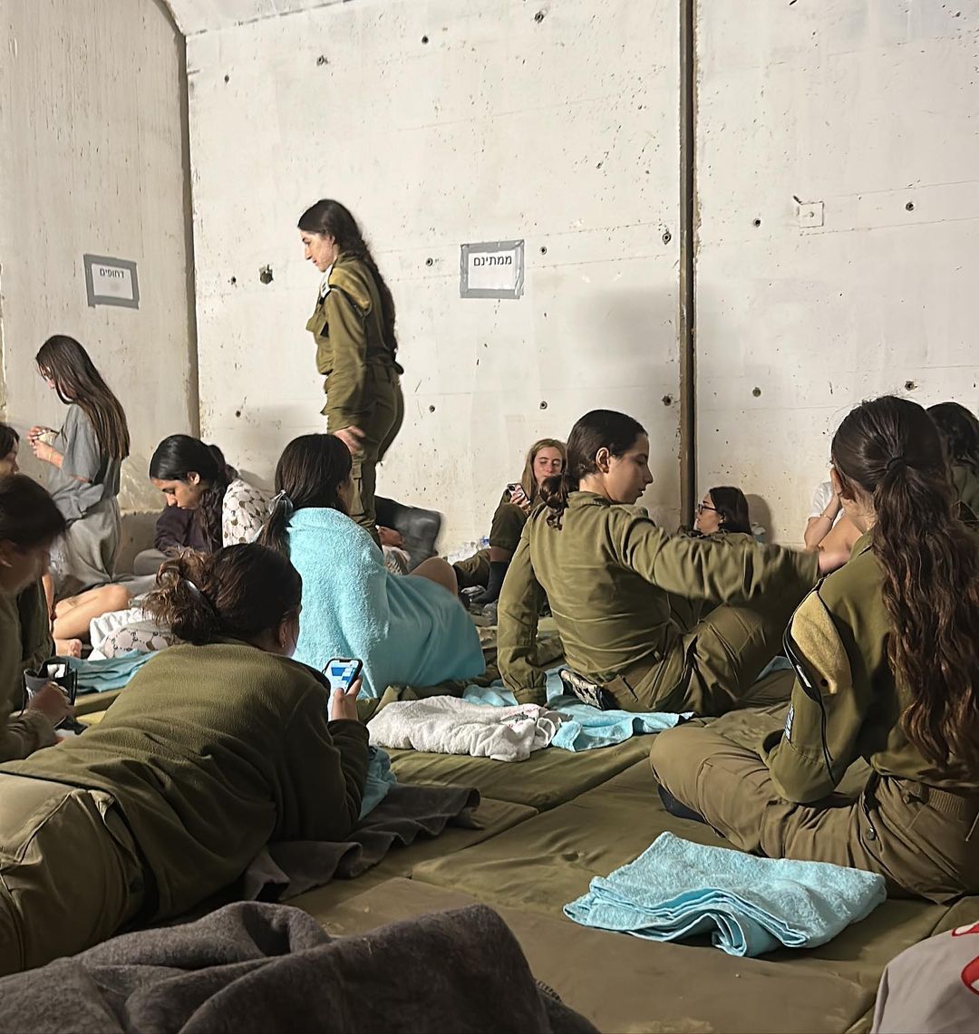 Soldiers sitting in the shelter