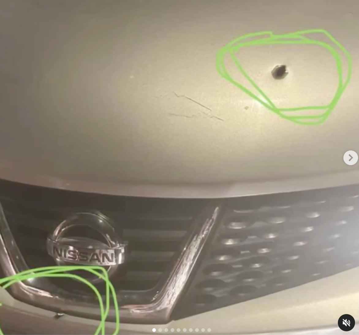 Bullet marks on a Nissan vehicle