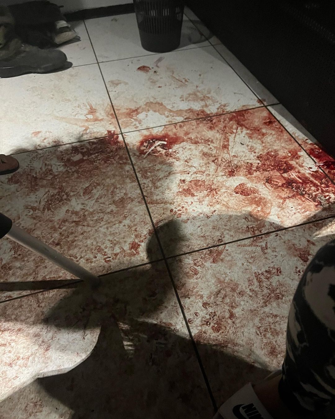 A floor covered in blood marks
