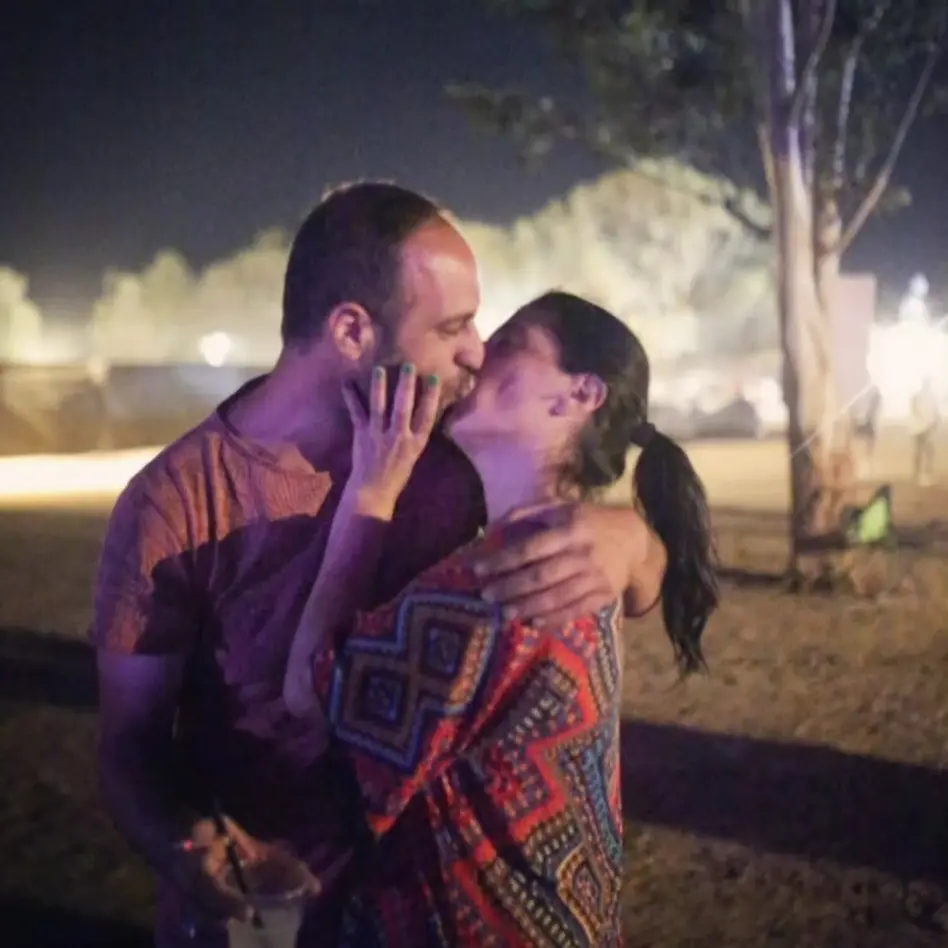Yasmin P. and her partner Tal kiss