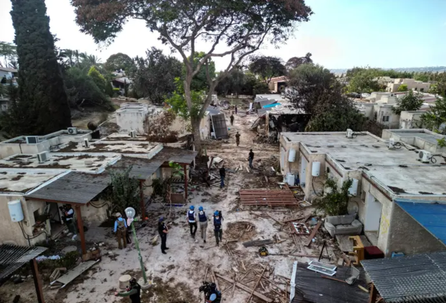 Shot angle from above. A street with destroyed houses.