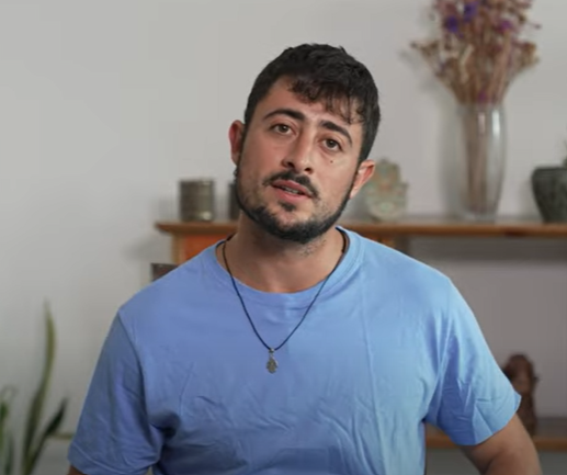 There is a man with a worried expression on his face.