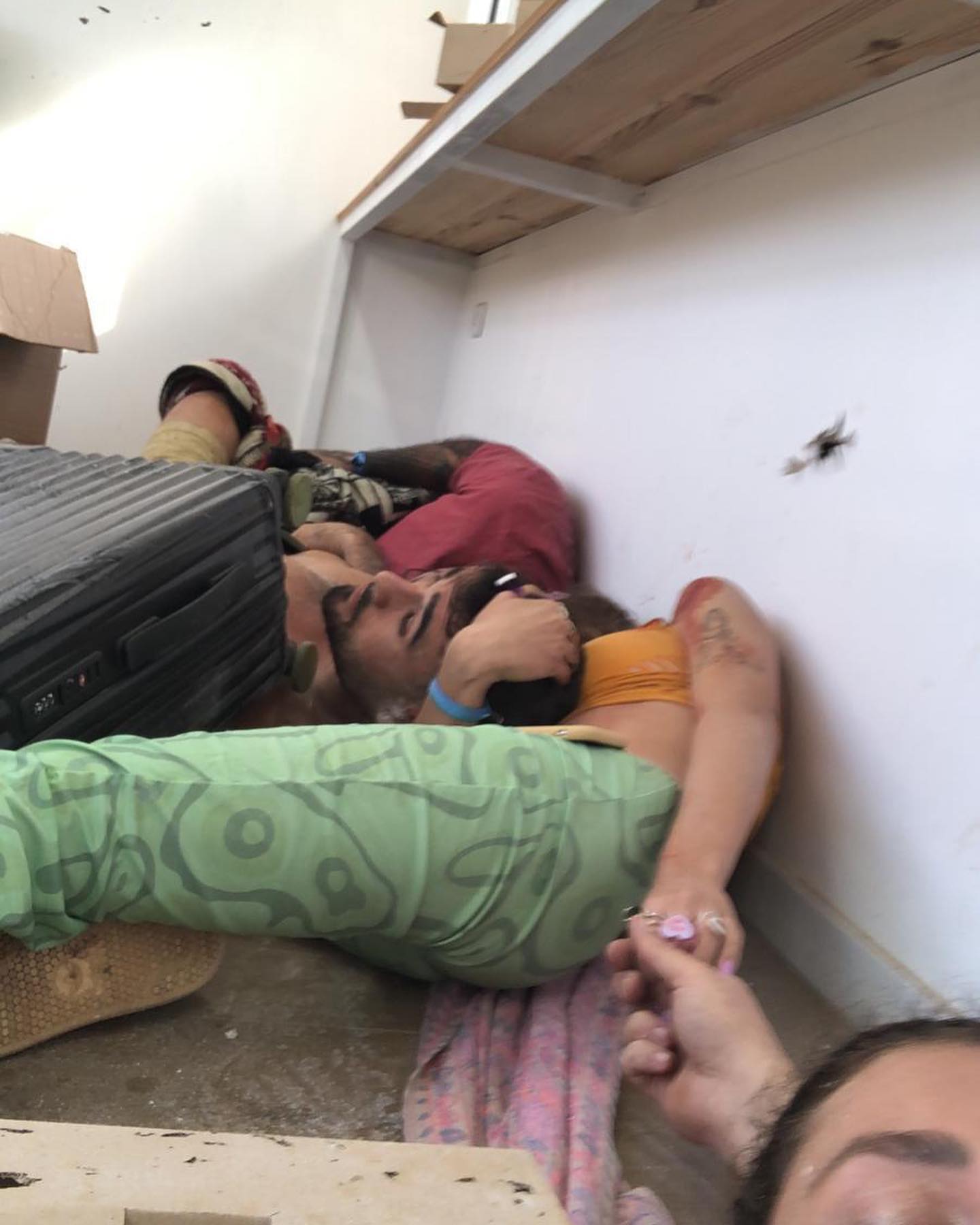 People are lying on the floor
