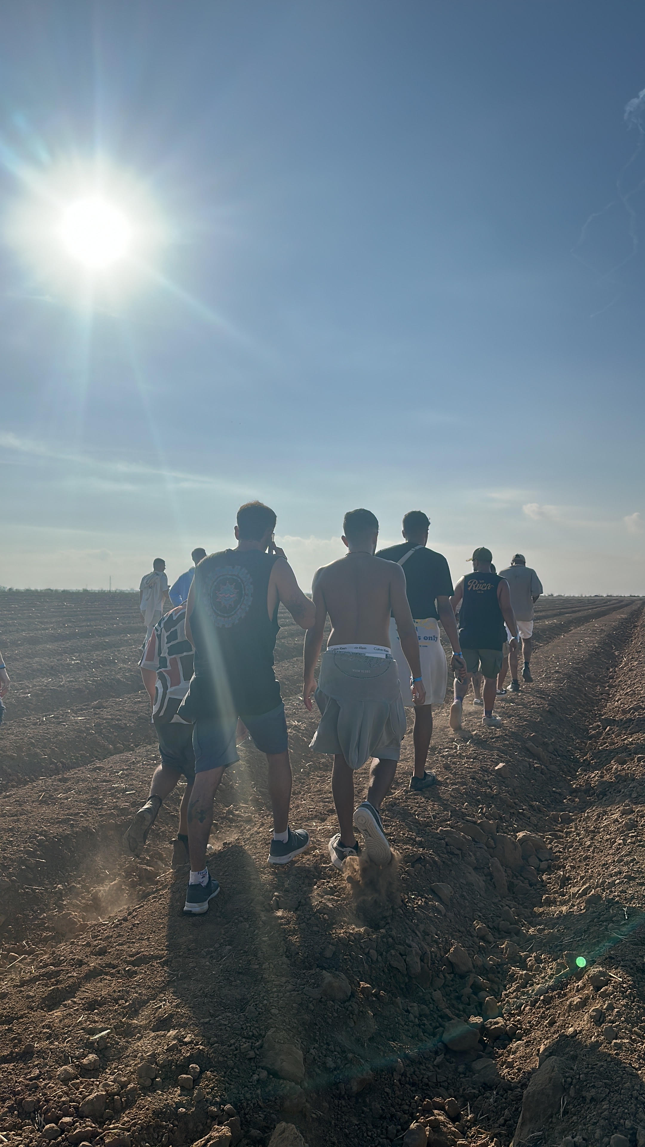 People run away in an open field