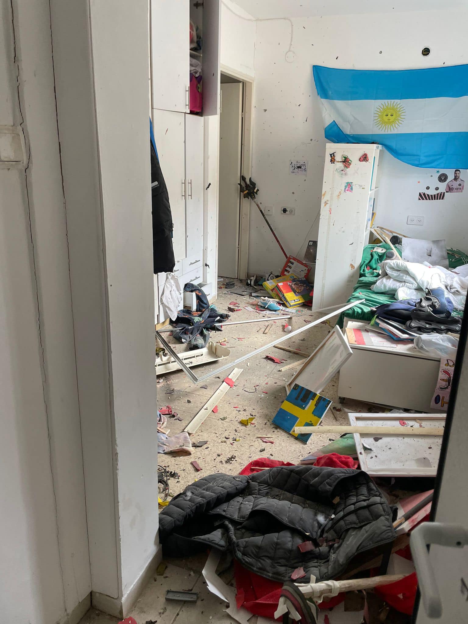 A room with broken furniture on the floor